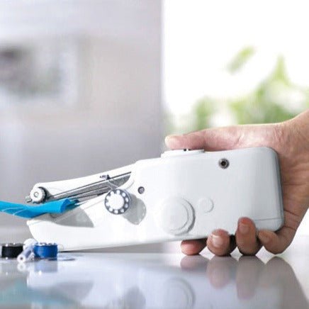 Handheld Portable Sewing Machine in use